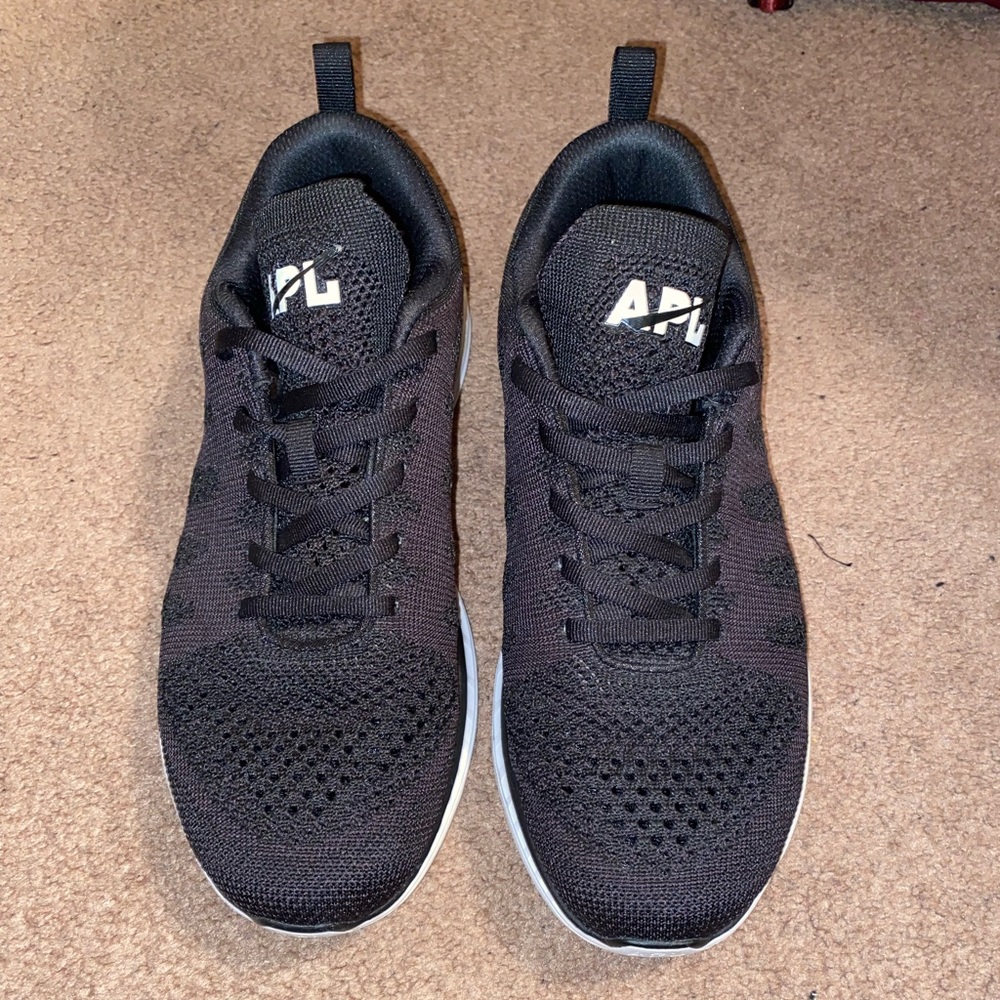Womens APL sneakers size 10
